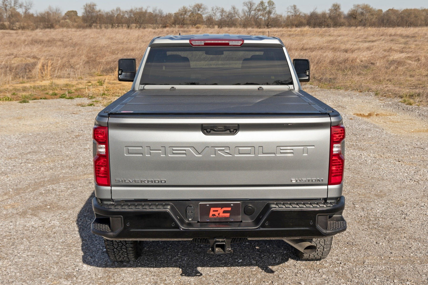 Hard Tri-Fold Flip Up Bed Cover | 6'9" Bed | Chevy/GMC Silverado/Sierra 2500HD/3500HD (20-24)