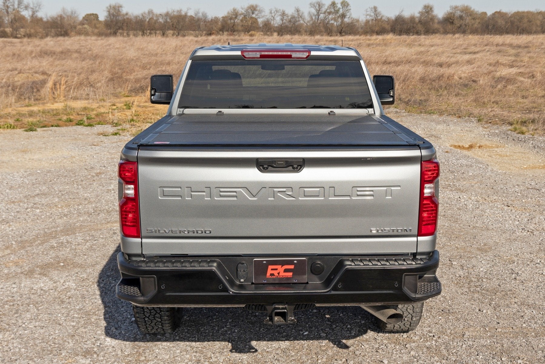 Hard Tri-Fold Flip Up Bed Cover | 6'9" Bed | Chevy/GMC  Silverado/Sierra 2500HD/3500HD (20-24)